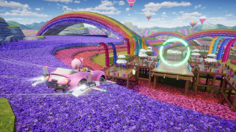 Sonic Racing: Crossworlds המון פרחים סגולים וורודים ומכונית בצבע ורוד 