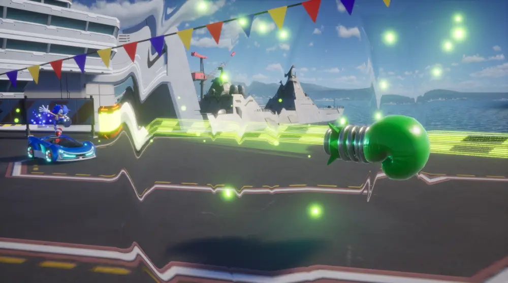 Sonic Racing: Crossworlds קישוטי דגלים מכונית כחולה וכפפת אגרוף ירוקה באוויר