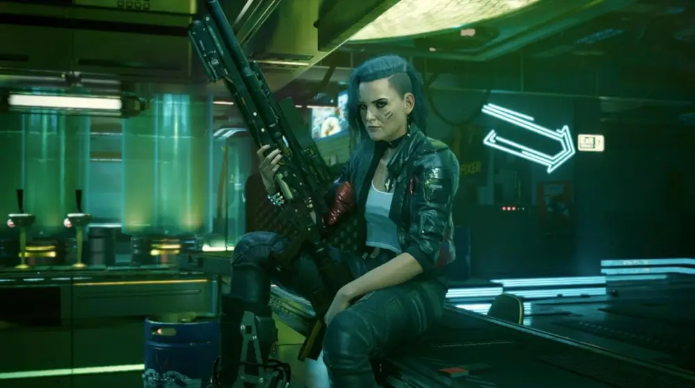 Cyberpunk 2077 Ultimate Edition אחת השחקניות יושבת ומחזיקה נשק